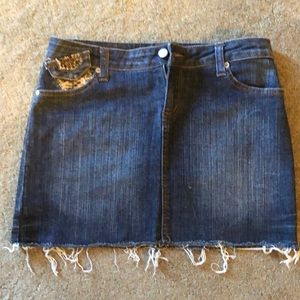 Cache denim mini skirt with leopard trim